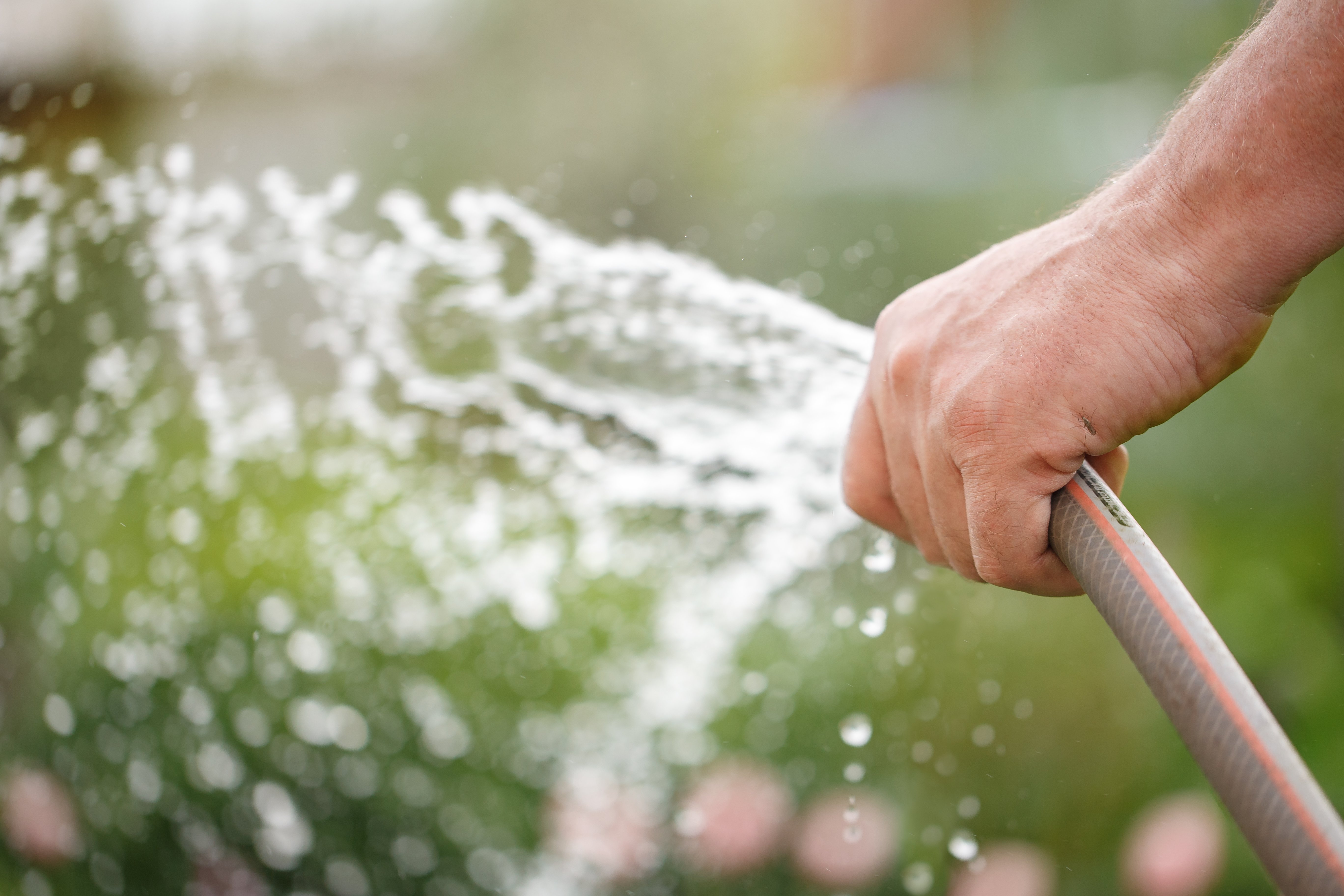 Holding water rubber hose tube. 