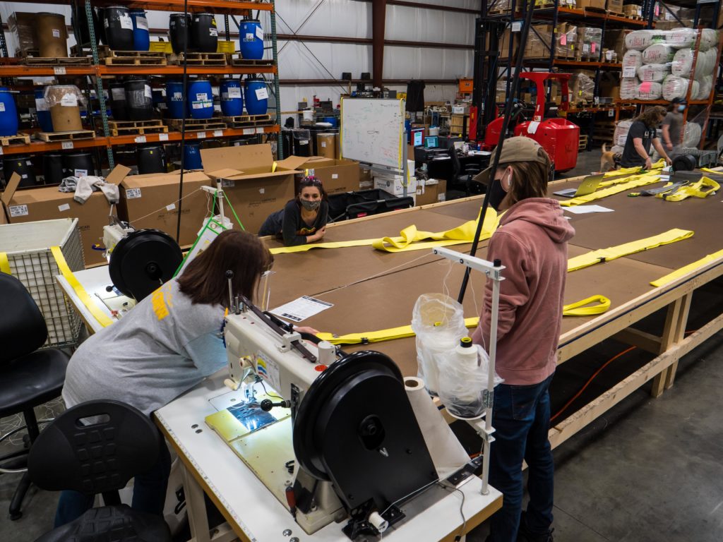 US Cargo Control creating tiedown straps in house